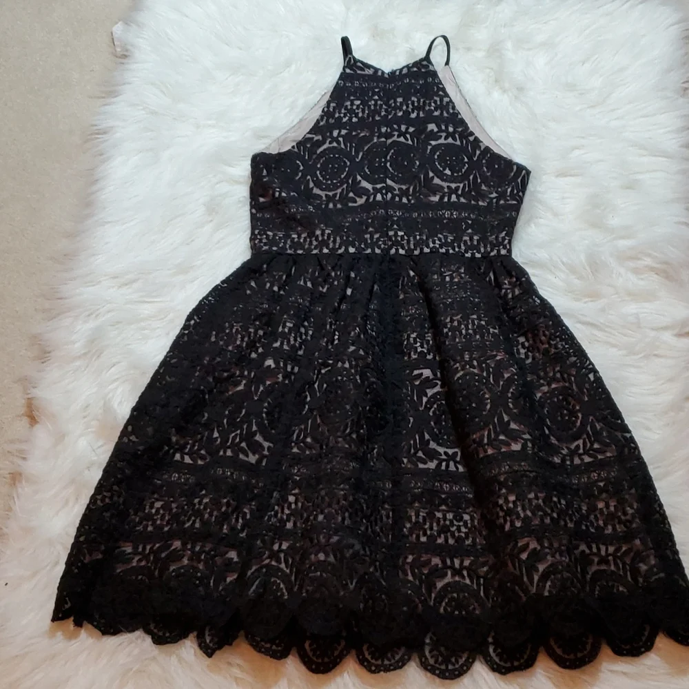 Soprano black with cream underlayer size small in like NEW condition
